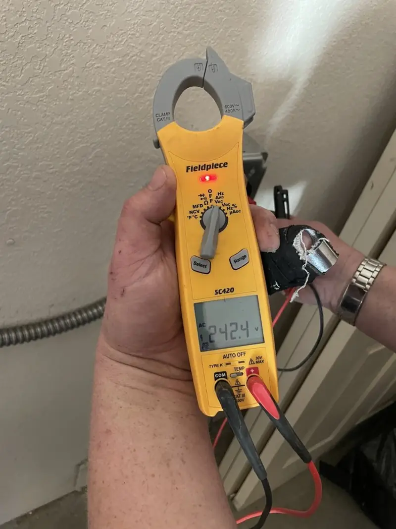 Voltage testing with clamp meter during Electrical Installation Services in Williston Highlands